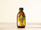Butelka naturalnego octu jabłkowego Olini, idealnego dla zdrowia Twojego psa. 100% naturalny, rzemieślniczy produkt.